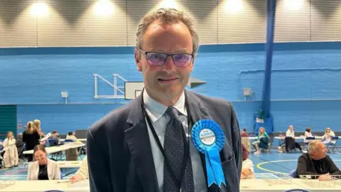 Zoe Dennis/BBC Petr Aldous at the 2024 general election count