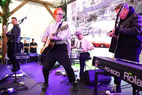 Getty Images Dougie Payne, Fran Healy, Neil Primrose and Andy Dunlop of Travis perform during day one of the TRNSMT Festival 2024