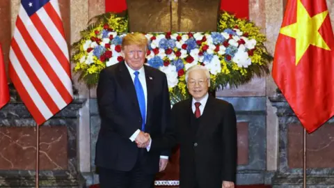 Reuters Nguyen Phu Trong and Donald Trump meeting in 2019