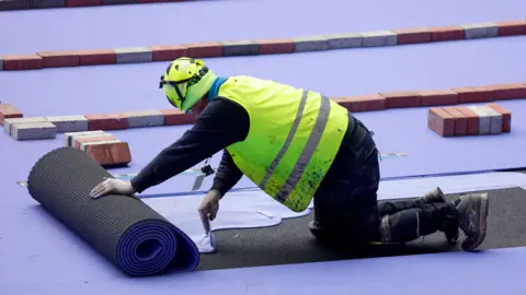 Mondo Worker lays the track at the Stade de France for the Paris Olympics