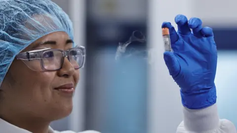 Reuters Lab worker in meat lab