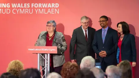 Getty Images From left: Carolyn Harris, Mark Drakeford, Vaughan Gething, Eluned Morgan