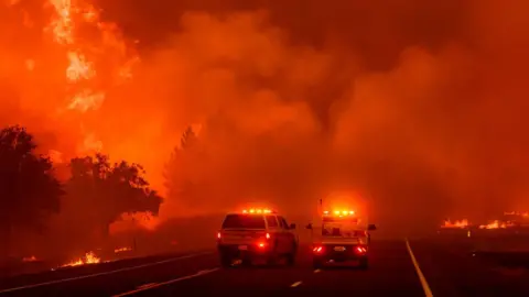 Getty Images Fire moves towards Highway 36 as the Park fire continues to burn near Paynes Creek in unincorporated Tehama County, California on July 26, 2024