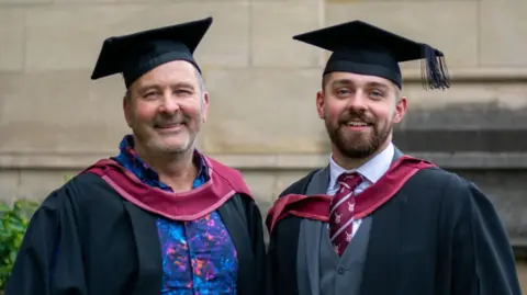 University of Bristol/PA Media Jonny Clothier (left, in a colourful shirt) stands next to his son Carter