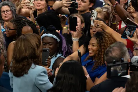 Getty Images Harris being photographed by supporters