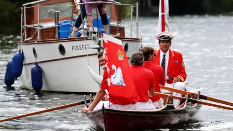 EPA People in rowing boat during the swan upping count in July 2024