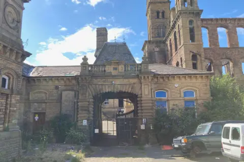 The Yorkshire stone front gates to Dalton Mills