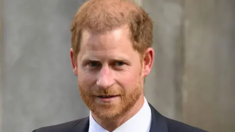 Getty Images Prince Harry with a beard.