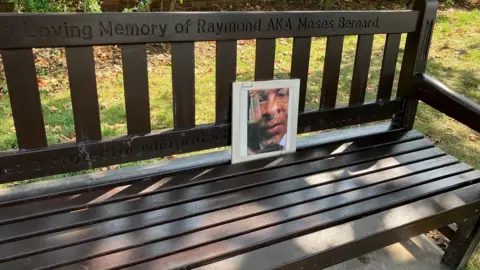 A memorial bench to Raymond 