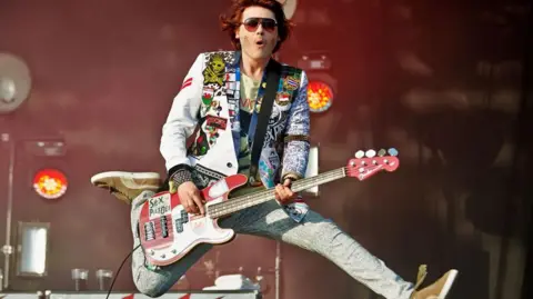 Getty Images Nicky Wire of Manic Street Preachers performs at Glastonbury Festival in 2014