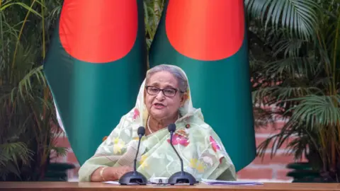 EPA Bangladesh Prime Minister Sheikh Hasina addresses a meeting with foreign observers and journalists in Dhaka in January 2024