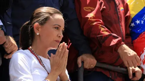 Reuters Venezuelan opposition leader Maria Corina Machado gestures during a march amid the disputed presidential election, in Caracas, Venezuela August 3, 2024.