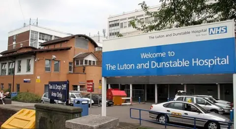 South Beds News Agency Exterior of the Luton and Dunstable Hospital showing the main signage and parking drop off 