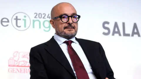 Getty Images Gennaro Sangiuliano speaking at a media event