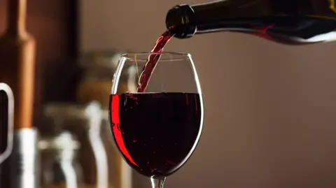 Getty Images Wine being poured (library picture)